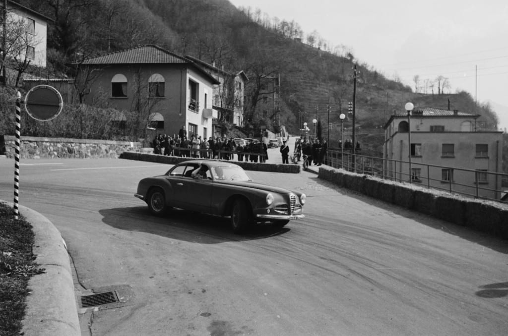 The ability to take you right into the action, as with this image of an Alfa Romeo manipulating a controlled corner slide on the Racing Driver’s Course, in Campione, Switzerland, fueled the high demand for Mailander’s work. 