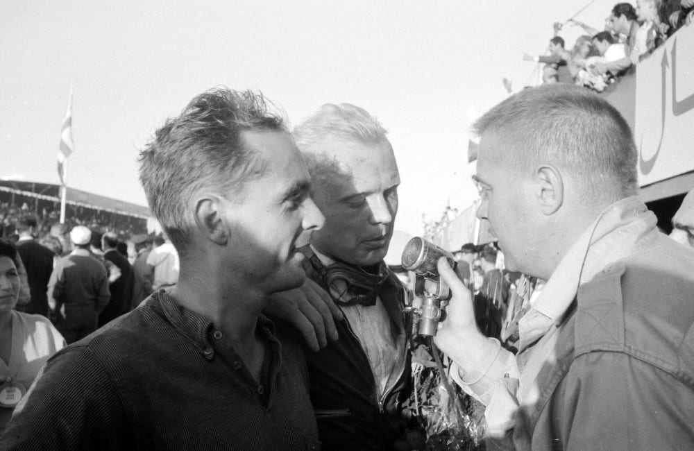 Ferrari drivers Phil Hill (left) and new World Champion Driver Mike Hawthorn finished third and second respectively