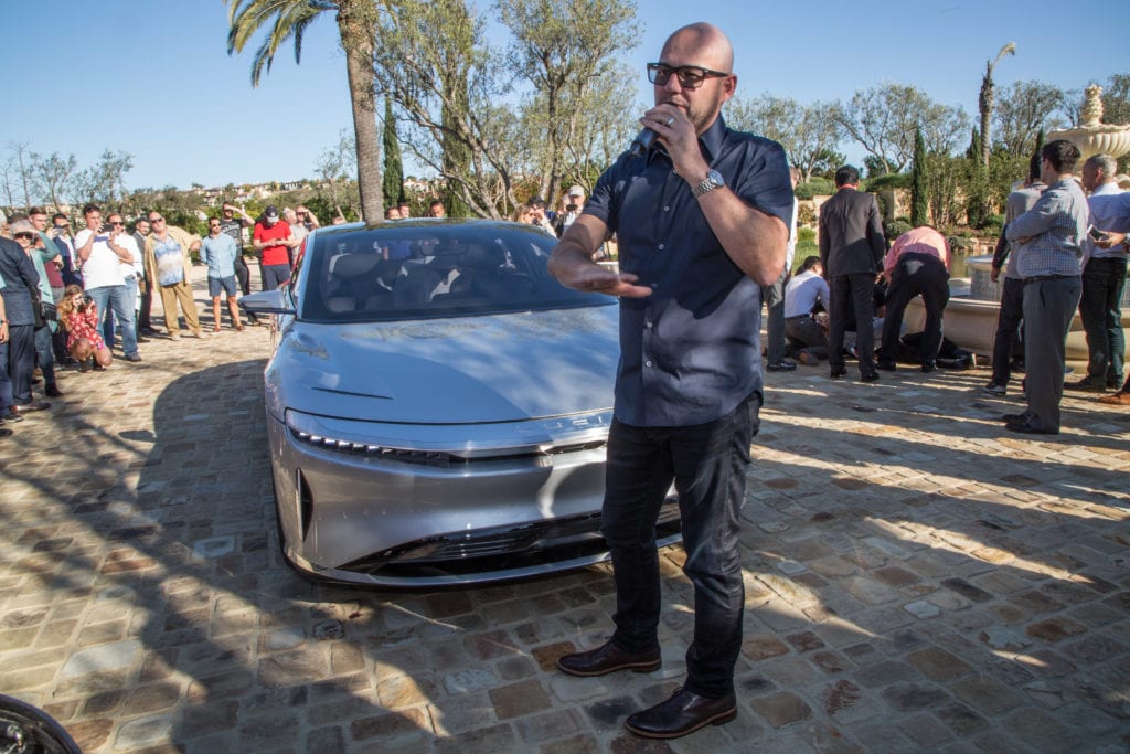 Vice President of Design, Lucid Air, Derek Jenkins with the Lucid Air automobile